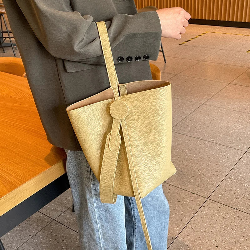 Commuter female package 2025 new oblique design senior feeling handbags women's shoulder bag, small hand-held tote bag bucket