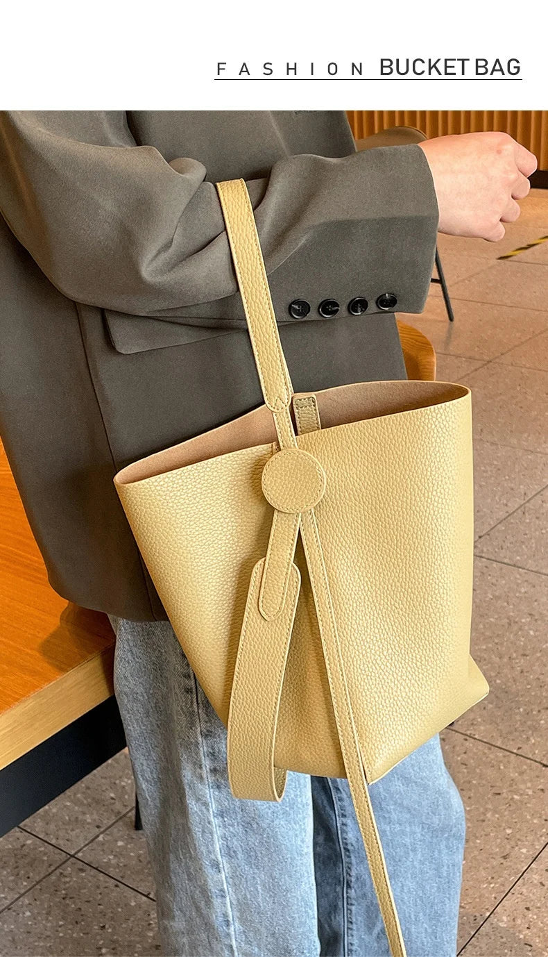 Commuter female package 2025 new oblique design senior feeling handbags women's shoulder bag, small hand-held tote bag bucket