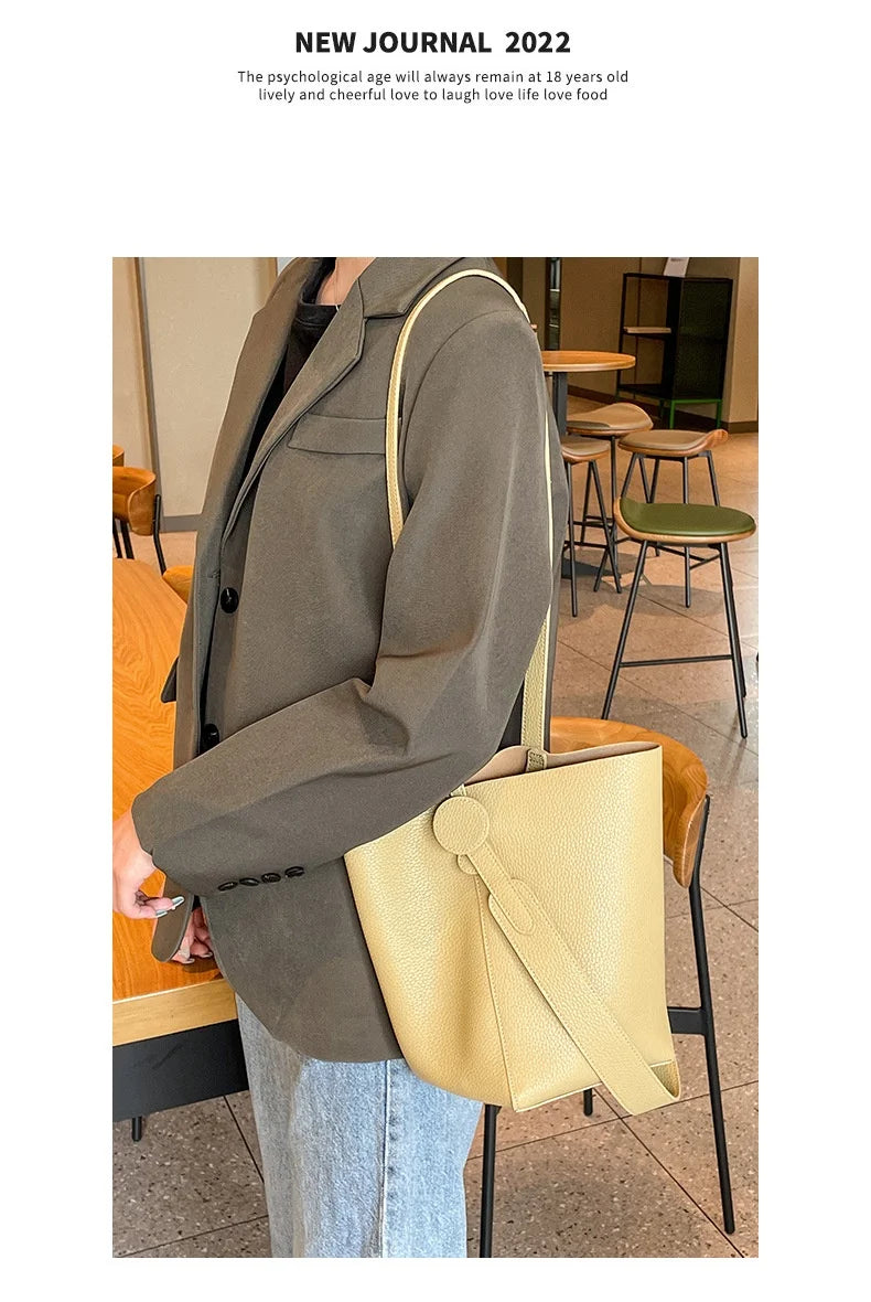 Commuter female package 2025 new oblique design senior feeling handbags women's shoulder bag, small hand-held tote bag bucket