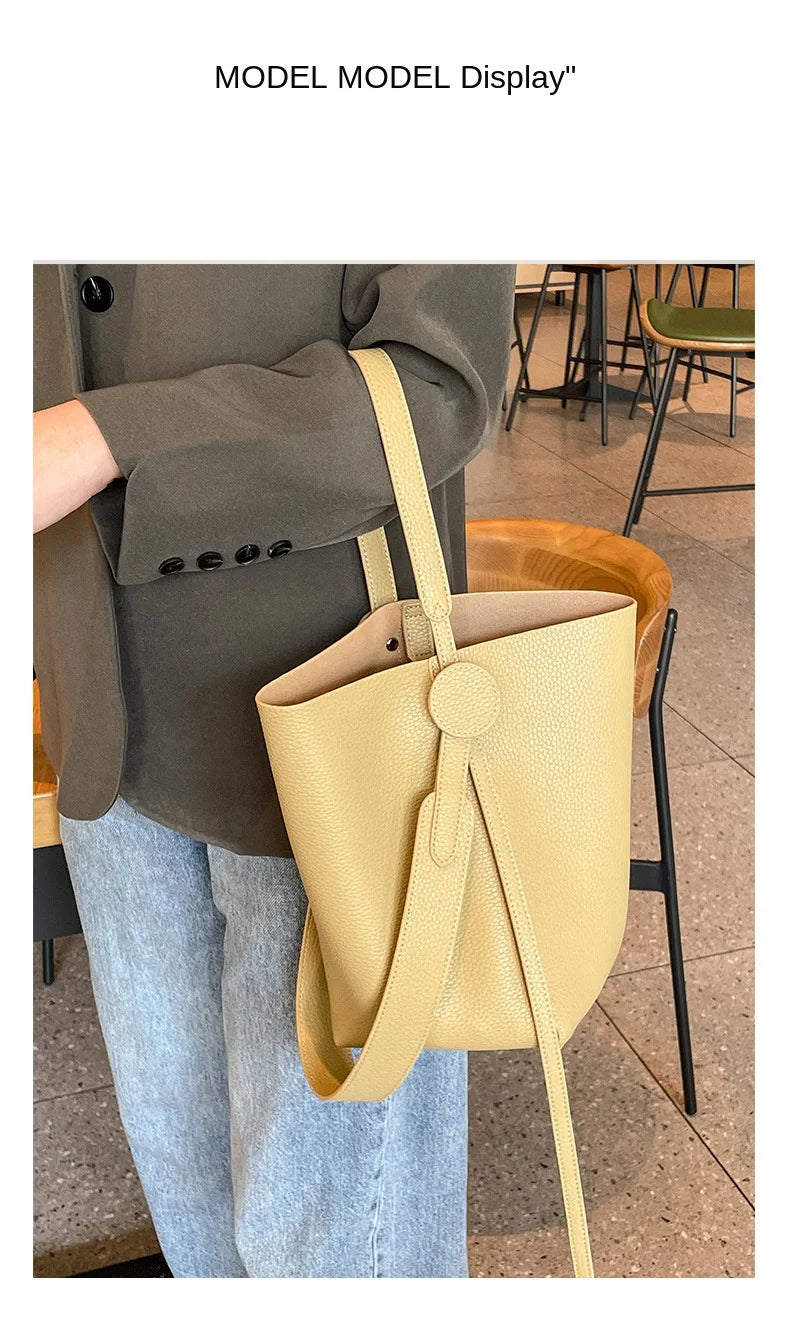 Commuter female package 2025 new oblique design senior feeling handbags women's shoulder bag, small hand-held tote bag bucket